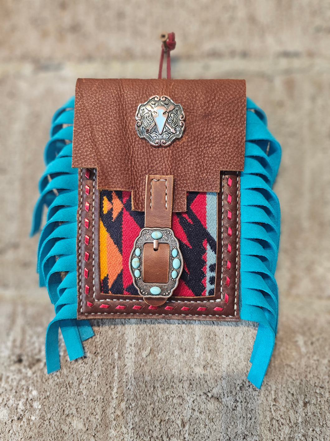 Back cinch cell phone holder